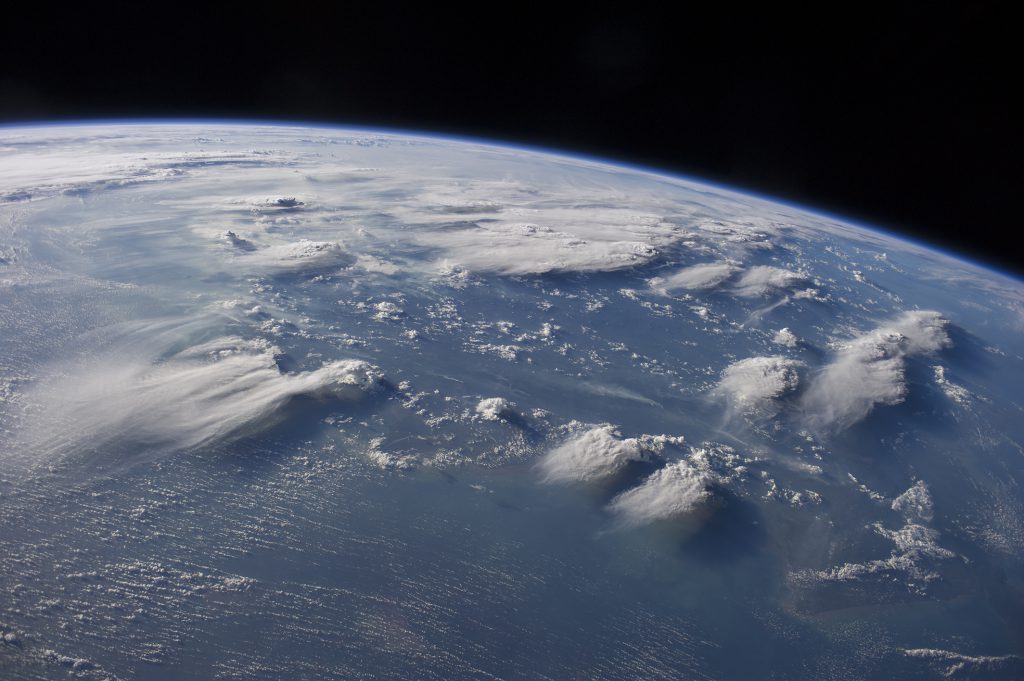 A collection of thunderstorms moves across Indonesia. With SMICES, researchers will be able to improve climate and weather models by measuring the small ice particles formed at the top of storm clouds. Image credit: NASA Earth Observatory / International Space Station (ISS)